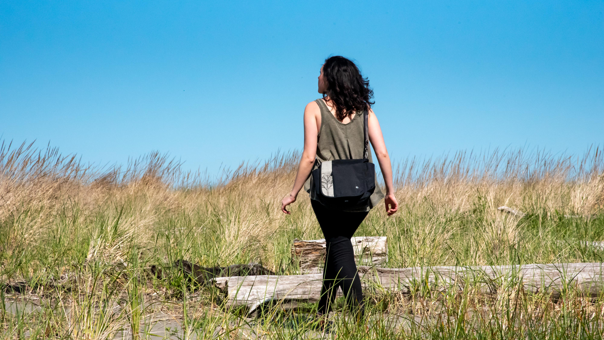 Haiku Bags woman walking in field